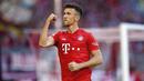 Gelandang Bayern Munchen, Ivan Perisic, melakukan selebrasi usai membobol gawang Koln pada laga Bundesliga di Allianz Arena, Sabtu (21/9/2019). Bayern Munchen menang 4-0 atas Koln. (AP/Matthias Schrader)