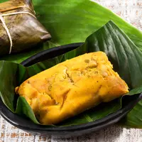 ilustrasi kue bungkus daun pisang/gcafotografia/Shutterstock
