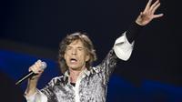 Pasca ditinggal kekasihnya, L'Wren Scott, Mick Jagger tampil memukau bersama The Rolling Stones di Oslo, Norwegia. (AFP/Terje Bendiksby)