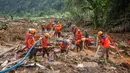 Hingga Rabu (22/1/2025) siang, bencana longsor yang terjadi di Desa Kasimpar, Kecamatan Petungkriyono, Kabupaten Pekalongan, Jawa Tengah telah menelan 20 korban jiwa, sementara sejumlah lainnya masih dinyatakan hilang. (DEVI RAHMAN/AFP)