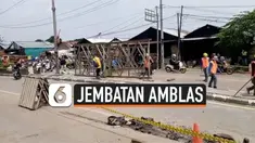 Jembatan Pacing yang berada di Cikarang amblas setelah diterjang banjir luapan sungai Citarum. Jembatan berada di jalan nasional yang menghubungkan Cikarang dan Karawang.