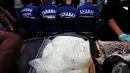 Puluhan kilogram narkoba jenis sabu ini disita Direktorat Narkoba Bareskrim dari empat tersangka sindikat internasional jaringan Tiongkok-Hongkong-Jakarta-Palembang, Jakarta Timur, Selasa (14/10/2014) (Liputan6.com/Johan Tallo)