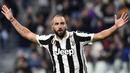 6. Gonzalo Higuain (Juventus) - Walaupun Juventus melangkah ke final, musim lalu dirinya hanya mampu mencetak lima gol. Meski demikian bomber Argentina itu tetap menjadi kandidat karena naluri mencetak golnya tinggi. (AFP/Miguel Medina)