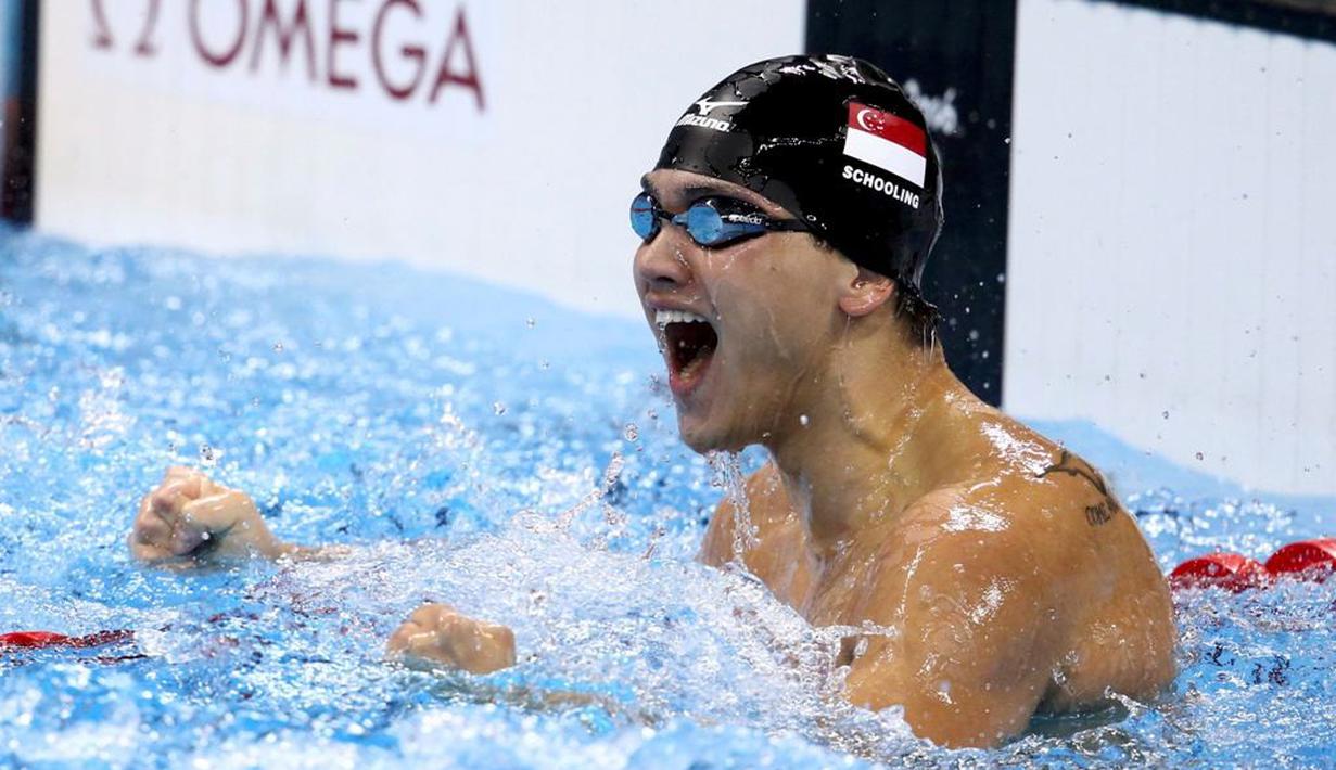  Ekspresi perenang putra Singapura, Joseph Schooling, setelah memenangi 100m gaya kupu-kupu putra Olimpiade Rio 2016 di Olympic Aquatics Stadium, Rio de Janeiro, Brasil, (12/8/2016). (Reuters/Marcos Brindicci)