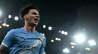 Gelandang Manchester City, Nico O’Reilly merayakan gol kedua timnya dalam pertandingan sepak bola Liga Inggris antara Manchester City dan Fulham di Stadion Etihad, Manchester, Inggris barat laut, pada 11 Februari 2026. (Paul ELLIS / AFP)