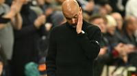 Momen Pep Guardiola tampak kecewa saat anak asuhnya Man City kalah dari Newcastle. (Oli SCARFF / AFP)
