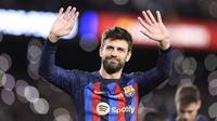 Berakhir sudah kebersamaan Gerard Pique bersama Barcelona yang telah dibelanya selama 15 musim sejak 2008/2009. Jebolan Akademi La Masia tersebut memutuskan pensiun secara mendadak dan secara resmi menjalani laga terakhirnya bersama Blaugrana di pekan ke-13 Liga Spanyol 2022/2023 kontra Almeria, Minggu (6/11/2022) dini hari WIB. (AFP/Josep Lago)