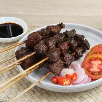 ilustrasi sate kambing/tyasindayanti/Shutterstock