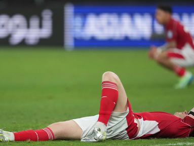 Pemain Timnas Indonesia terkapar lesu setelah ditaklukkan Australia dalam matchday ketujuh Grup C di Sydney Football Stadium, Sydney, pada Kamis (20/3/2025) sore WIB. (AP Photo/Mark Baker)