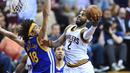 Guard Cavaliers, Kyrie Irving #2 melakukan lay up melewati hadangan forward Warriors, Anderson Varejao #18 pada game ke-3 NBA Finals di Quicken Loans Arena, (9/6/2016) WIB. (Mandatory Credit: David Richard-USA TODAY Sports)