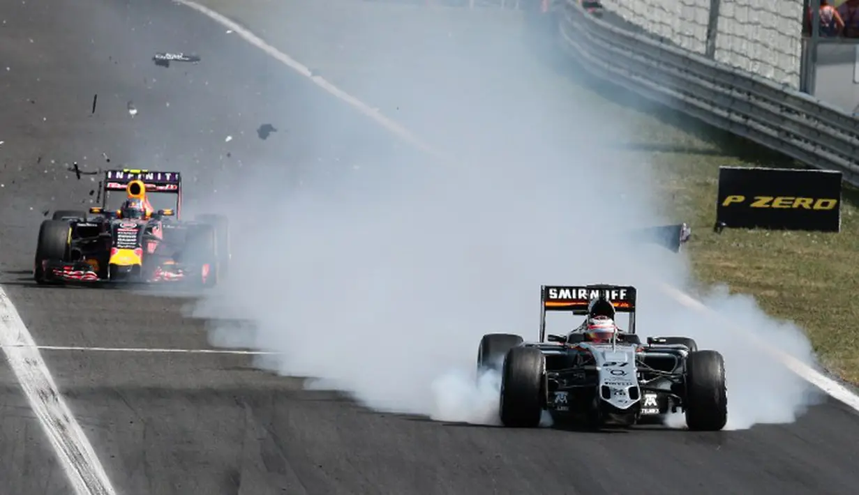 Mobil pebalap Sahara Force India, Nico Huelkenberg, mengalami kerusakan di tengah lomba. (AFP PHOTO/Ferenc Isza)
