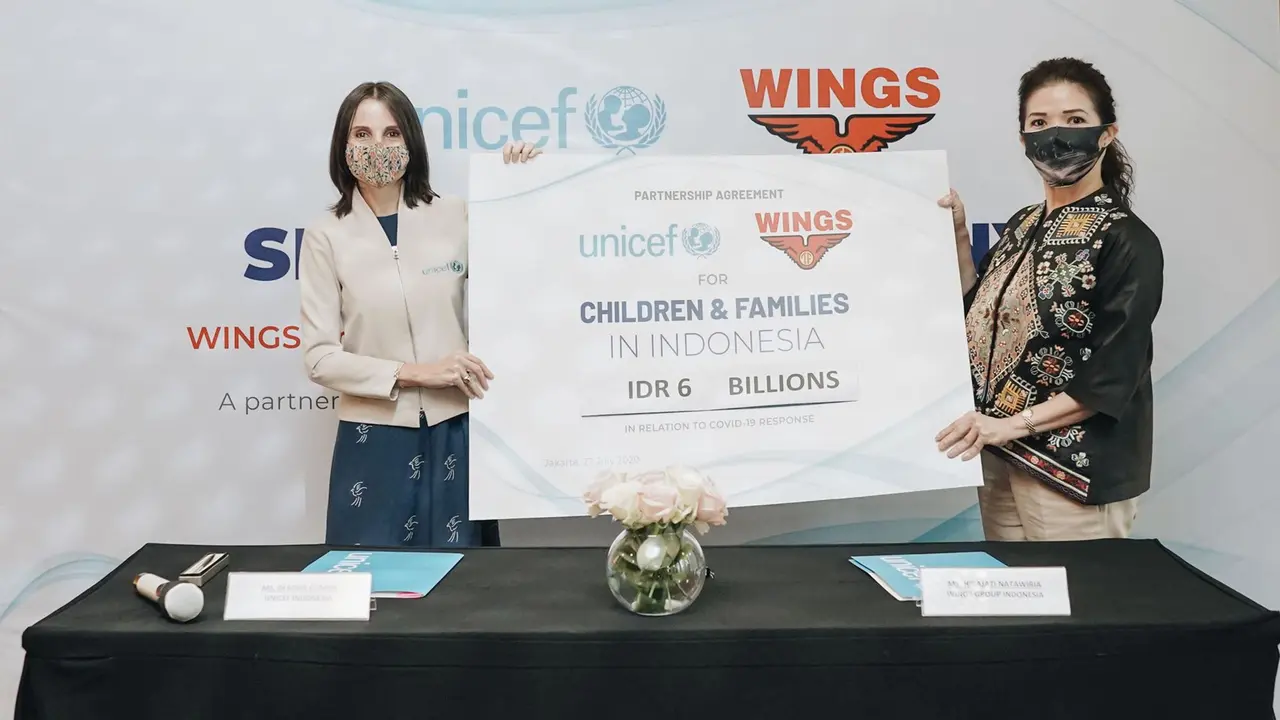tanda tangan wings dan unicef