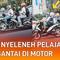 Terekam oleh penumpang mobil, seorang pelajar lakukan aksi nyeleneh.