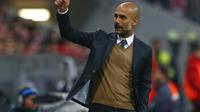 Pelatih Bayern Munchen, Pep Guardiola, bertekad mempersembahkan gelar treble musim ini. (REUTERS/Michaela Rehle)