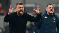 Daniele De Rossi yang kini menjabat sebagai pelatih Genoa. (Stefano RELLANDINI / AFP)
