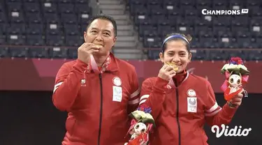 Ganda campuran Indonesia, Hary Susanto/Leani Ratri Oktila berhasil merebut emas kedua di Badminton SL3-SU5 Paralimpiade Tokyo 2020. Hary/Leani berhasil kalahkan ganda campuran Prancis Lucas Mazur/Faustine Noel dengan skor 2-0 23-21, 21-17 di Yoyogi N...