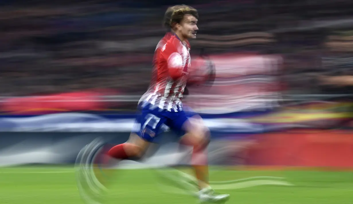 Antoine Griezmann dikontrak Barcelona selama lima musim hingga 30 Juni 2024 mendatang. (Photo by OSCAR DEL POZO / AFP)