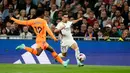 Real Madrid pesta gol pada pekan ke-13 La Liga Spanyol. Tim racikan Carlo Ancelotti menang telak 5-1 atas Valencia. (AP Photo/Jose Breton)