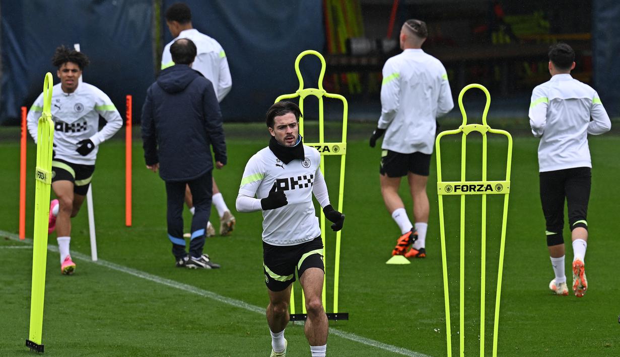 Kalah 3-4 pada leg pertama di Inggris, pasukan Carlo Ancelotti menang 3-1 lewat extra time atas City pada leg kedua di Bernabeu dan melangkah ke final. (AFP/Paul Ellis)