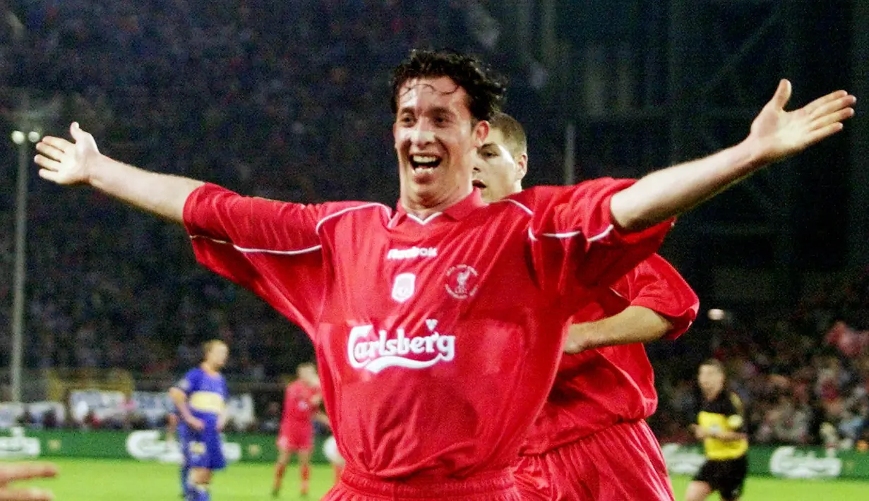 4. Robbie Fowler (Liverpool) - Legenda The Reds ini mampu menorehkan tiga gol dalam waktu 4 menit 33 detik saat berhadapan dengan Arsenal pada musim 1994/95. Ketiga gol dari Fowler terjadi di menit 26, 29 dan 31. (AP/Frank Augstein)