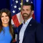 Donald Trump Jr (kanan) bersama kekasihnya, Kimberly Guilfoyle. (Photo credit: AFP Photo/JIM WATSON)