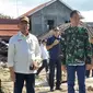 Presiden Joko Widodo (Jokowi) bersama dengan Menteri PUPR Basuki Hadimuljono dan Menko Polhukam Wiranto mengunjungi lokasi gempa di Palu, Sulawesi Tengah. (Septian Deny/Liputan6.com)