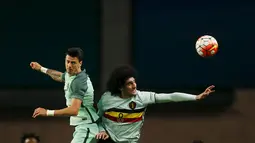 Pemain Belgia, Marouane Fellaini, dikenal sebagai muslim yang taat. Namun, saat Piala Eropa 2016 nanti Fellaini mungkin tidak berpuasa saat bertanding. (Reuters/Rafael Marchante)