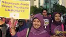 Sejumlah wanita melakukan kampanye Hari Lupus yang diperingati pada 10 Mei 2015 pada Car Free Day di Bunderan HI, Jakarta, Minggu (10/5/2015). Kampanye ini mensosialisasikan kepada masyarakat tentang penyakit lupus. (Liputan6.com/Herman Zakharia)