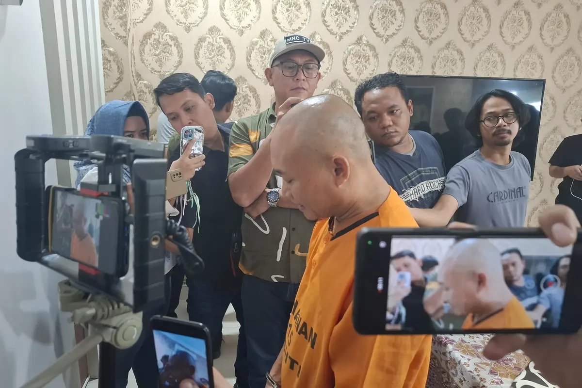 AT, tersangka penipuan dan penggelapan dana KKL 106 mahasiswa FKIP Unila. Foto : (Liputan6.com/Ardi).