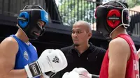 Robby R Sonjaya, saat menjadi wasit di salah satu ajang olahraga kick boxing (Liputan6.com/Istimewa)