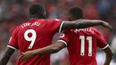 Striker Manchester United, Anthony Martial, bersama Romelu Lukaku merayakan gol ke gawang West Ham pada laga Premier League di Stadion Old Trafford, Manchester, Minggu (13/8/2017). Manchester United menang 4-0 atas West Ham. (AP/Dave Thompson)