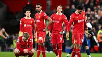 Sejumlah pemain Liverpool loyo setelah dipastikan tersingkir dari Liga Champions 2024/2025 menyusul kekalahan dari PSG pada leg kedua babak 16 besar, Rabu (12/3/2025) dini hari WIB. (Oli SCARFF / AFP)