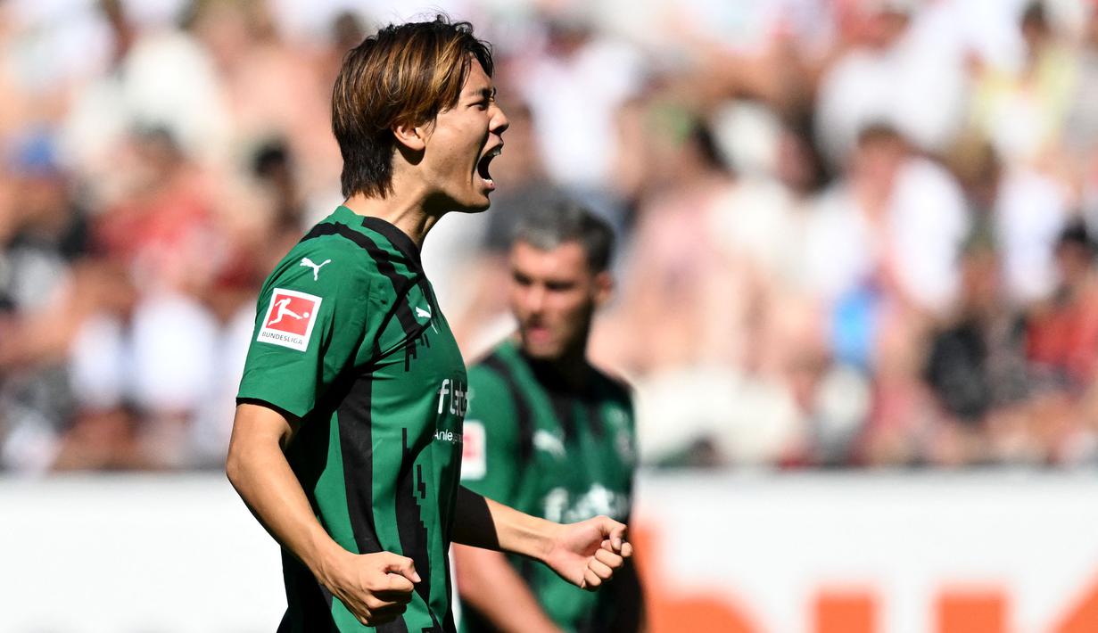 Ko Itakura tampil apik bersama Borussia Moenchengladbach dalam 2 musim terakhir. Hal itu yang membuat dirinya kembali dipanggil oleh Timnas Jepang untuk Piala Asia 2023. Itakura diprediksi akan menjadi pilihan utama skuad Samurai Biru asuhan Hajime Moriyasu di posisi bek tengah. (AFP/Christof Stache)