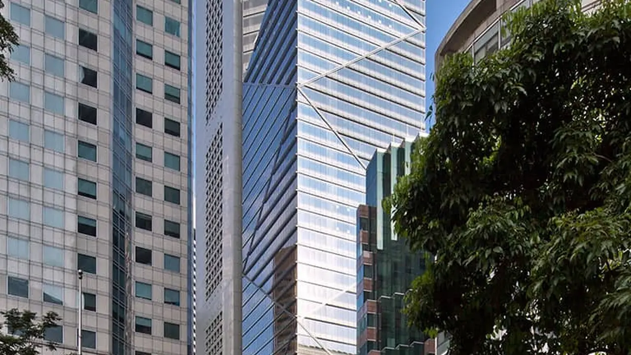 Taipan Mochtar Riady dan keluarganya berencana menjual One Raffles Place, salah satu gedung pencakar langit tertinggi di kawasan pusat bisnis Singapura. Dok One Raffles Place