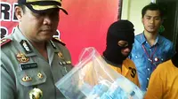 Barang bukti uang palsu yang disita polisi di Serang, Banten. (Liputan6.com/Yandhi Deslatama)