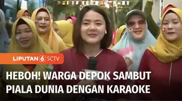 Antusiasme warga menyambut Piala Dunia 2022 di Qatar juga terasa di Kota Depok, Jawa Barat. Mereka menyambut Opening Ceremony Piala Dunia mulai dari senam, karaoke, hingga nonton bareng.