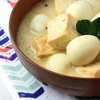 Ilustrasi opor telur puyuh tahu. (Foto: Pinterest/Dreamstime Stock Photos)