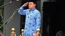 Mendagri Tjahjo Kumolo saat memimpin upacara peringatan Hari Ibu ke-86 di halaman Kemdagri, Jakarta, Senin (22/12/2014). (Liputan6.com/Johan Tallo)