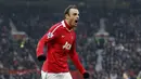 4. Dimitar Berbatov - Pemain Bulgaria ini pernah mencatatkan tinta emas di Old Trafford. Tidak hanya berhasil membawa Manchester United juara Liga Inggris dalam dua musim, Ia juga sukses meraih gelar top skor pada musim 2010/2011 setelah mengoleksi 20 gol. (AP/Jon Super)