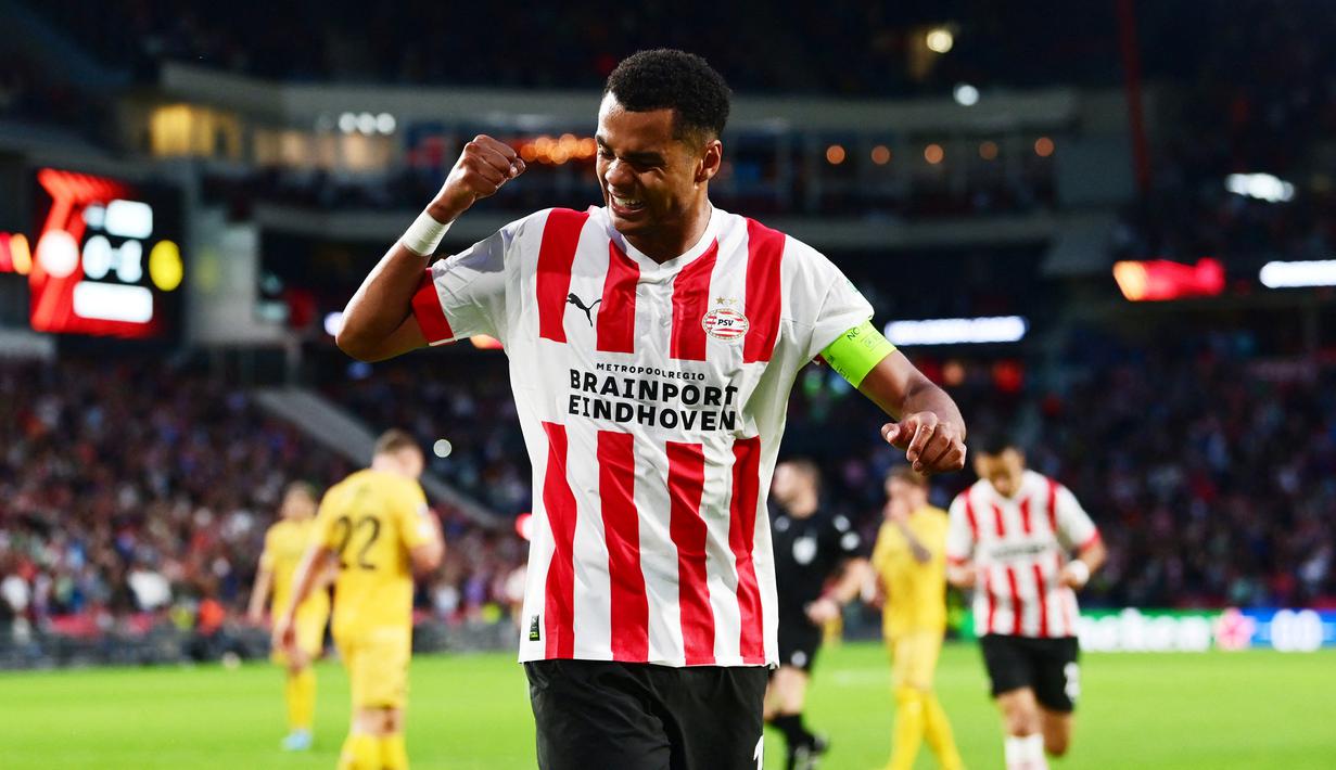 Cody Gakpo. Sayap kiri Belanda berusia 23 tahun ini menjadi pemain Eredivisie terbaru yang didapatkan Liverpool setelah penampilan apiknya di Piala Dunia 2022 lalu. The Reds berhasil menikung Manchester United dalam persaingan untuk mendapatkan pemain asal PSV tersebut. Transfer senilai 42 juta euro telah disepakati kedua klub untuk perpindahan pemain yang total tampil dalam 159 laga bersama PSV di semua ajang dengan torehan 55 gol dan 50 assist. (AFP/Olaf Kraak)