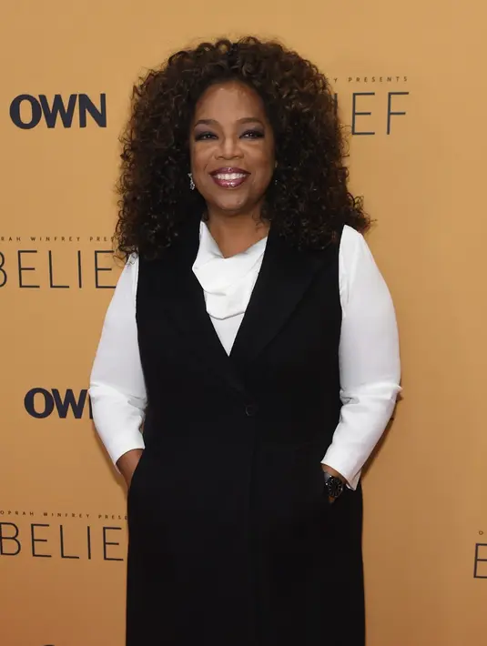 Dengan acara bincang-bincangnya yang melegenda, serta saluran televisinya sendiri OWN. (AFP/Bintang.com)