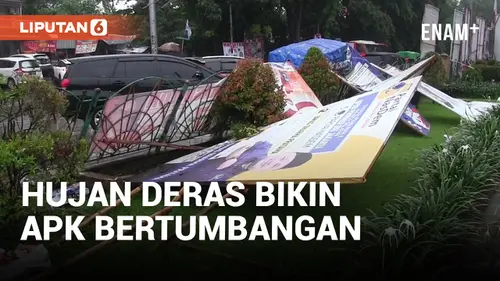 VIDEO: Hujan Deras, Alat Peraga Kampanye Bertumbangan di Jalan