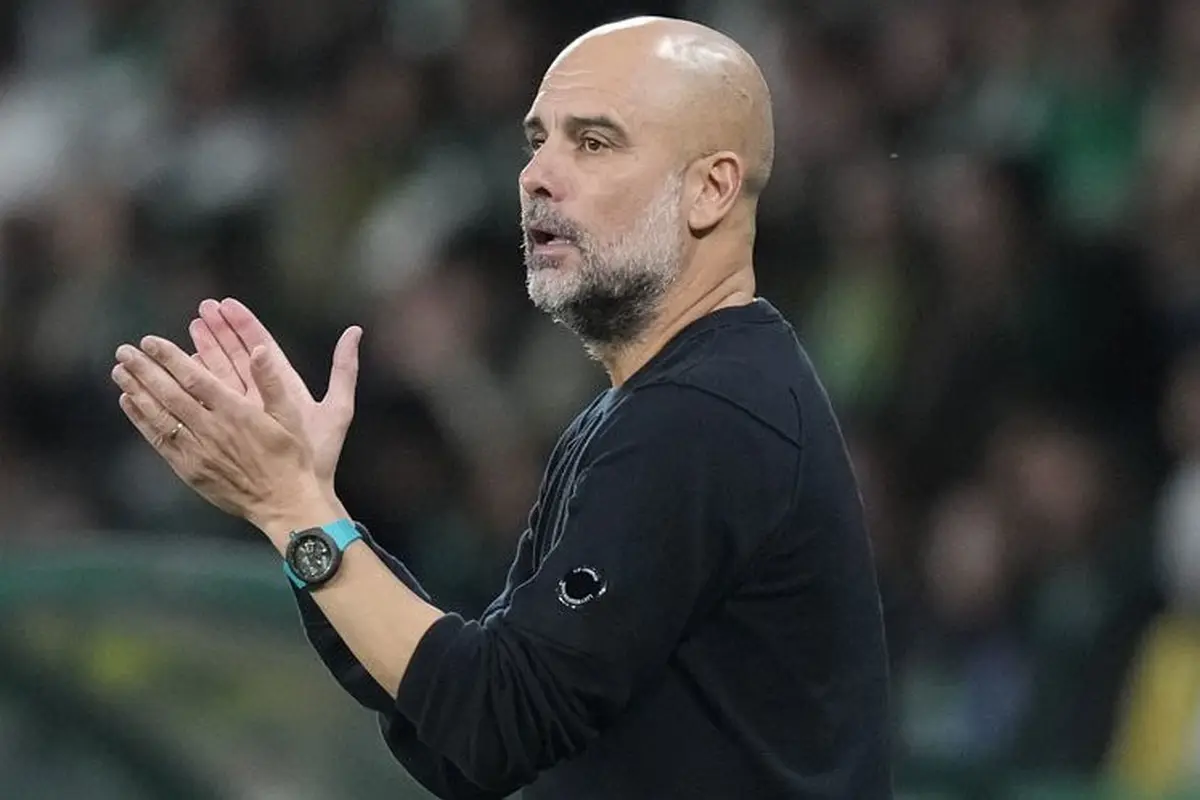 Josep Guardiola pada laga Sporting CP vs Man City di Liga Champions 2024/2025 (c) AP Photo/Armando Franca
