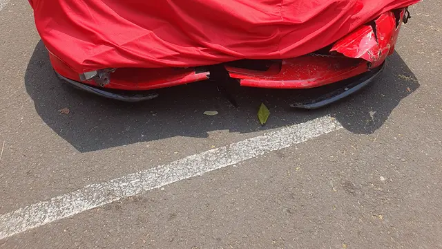 Polisi tetapkan pengemudi Ferrari RAS (29) sebagai tersangka terkait kecelakaan yang terjadi di Jalan Jendral Sudirman, Jakarta Selatan, pada Minggu (8/10/2023).
