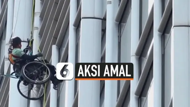 VIDEO: Pengguna Kursi Roda Panjat Gedung Bertingkat Demi Amal