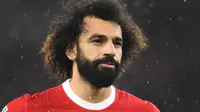 Ekspresi pemain Liverpool, Mohamed Salah saat laga lanjutan Liga Inggris 2023/2024 melawan Newcastle di Anfield, Liverpool, Inggris, Selasa (02/01/2023) dini hari WIB. (AFP/Peter Powell)