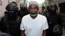 Martin Anderson alias Belo (tengah) usai mengikuti sidang peninjauan kembali di PN Jakarta Selatan, Kamis (19/3/2015). Belo mengajukan PK terkait vonis hukuman mati karena terbukti membawa narkoba jenis heroin seberat 50 gram. (Liputan6.com/Johan Tallo)