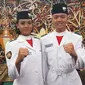 Paskibraka asal Kalimanten Timur Ferina Julia Syarif dan Alfares Deo Simangunsong. (Liputan6.com/Aditya Eka Prawira)