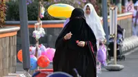 Ribuan jamaah bersiap salat Idul Fitri 1439 H di lapangan Pancasila, Simpanglima, Kota Semarang, Jumat (15/6). Masyarakat Indonesia hari ini merayakan Hari Raya Idul Fitri 1439 H sesuai ketetapan pemerintah yakni pada Jumat (15/6). (Liputan6.com/Gholib)