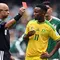 Dalam laga tersebut juga diwarnai dengan tiga kartu merah dan tiga kartu kuning. Wasit Wilton Sampaio mengganjar dua kartu merah untuk pemain Afrika Selatan, Yaya Sithole (50') dan Themba Zwane (84') serta satu kartu merah untuk pemain tuan rumah, Cesar Montes (90+2'). (AFP/Yuri Cortez)